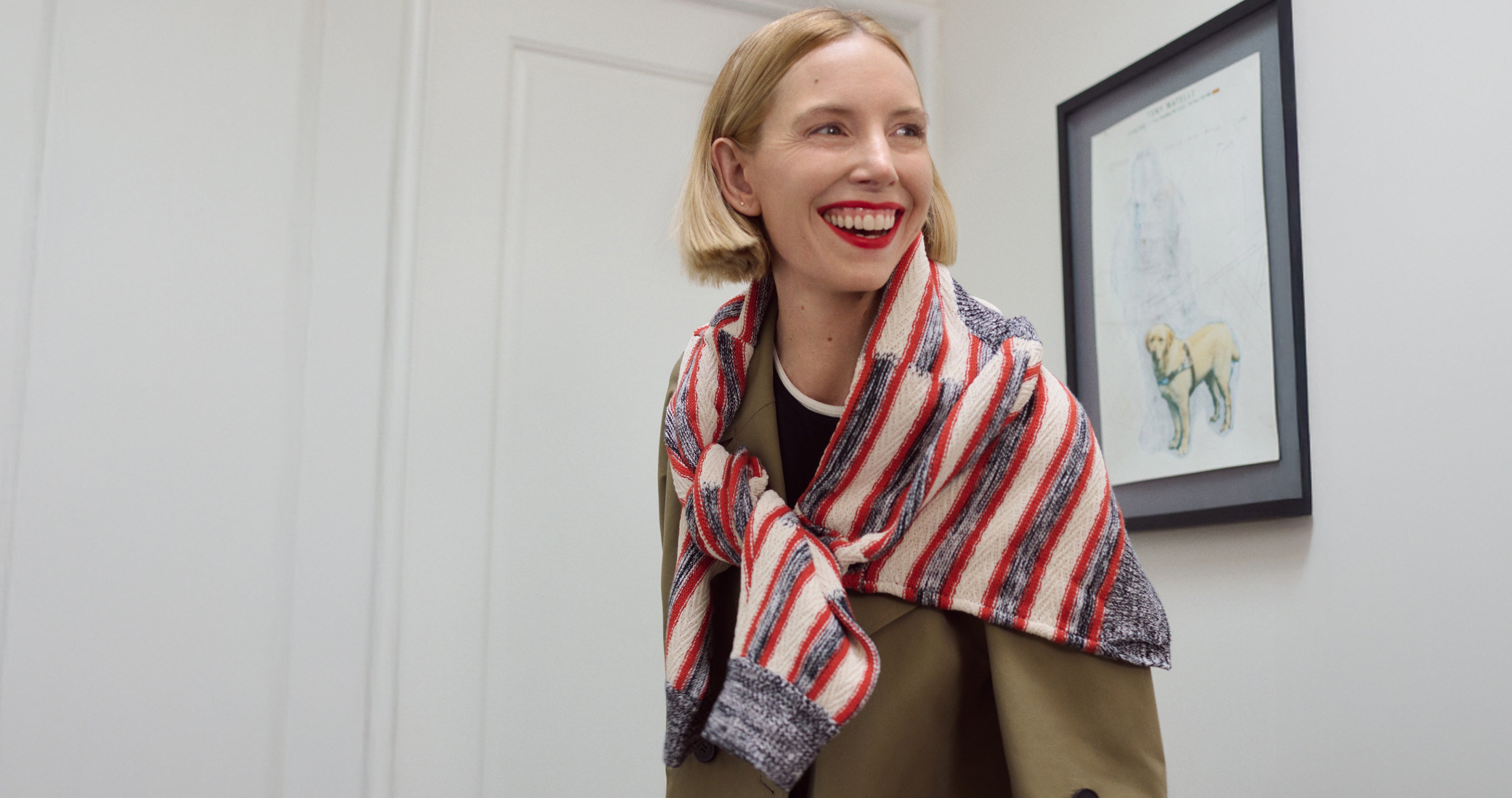 Image of Erin Jennie Pollard at home wearing the Curtis Trench and Miriam Sweater