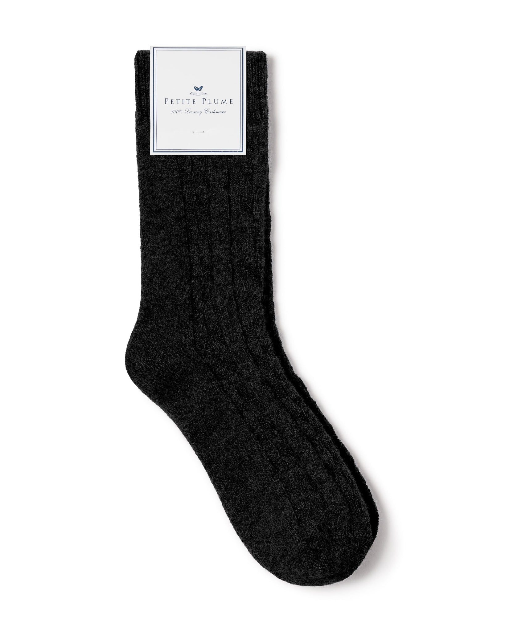 Black sock with a brand label on a white background 
