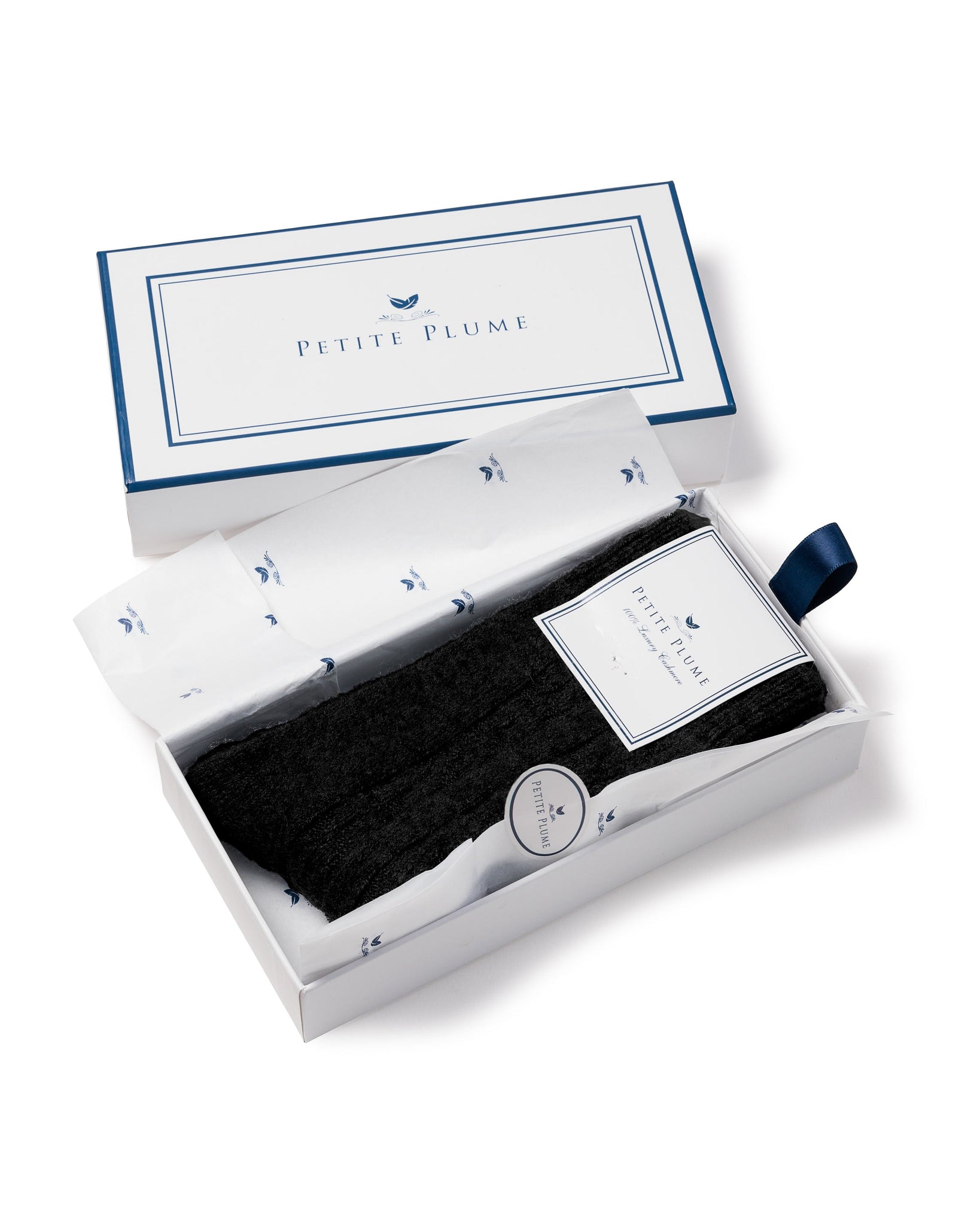 Black bow tie in a Petite Plume box on a white background
