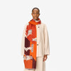 image of a woman wearing the les cheris scarf in red