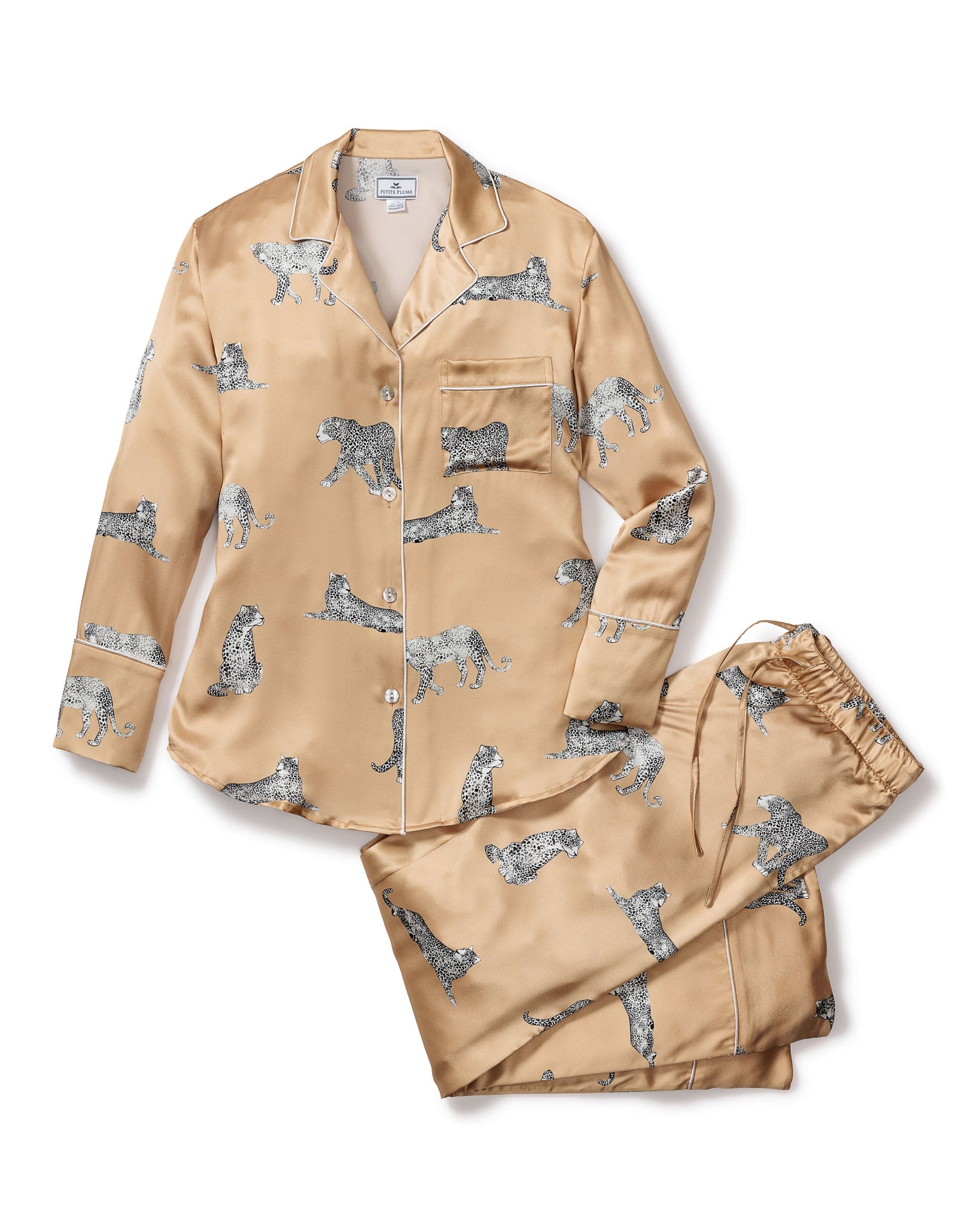 Beige pajama set with animal pattern on a white background 
