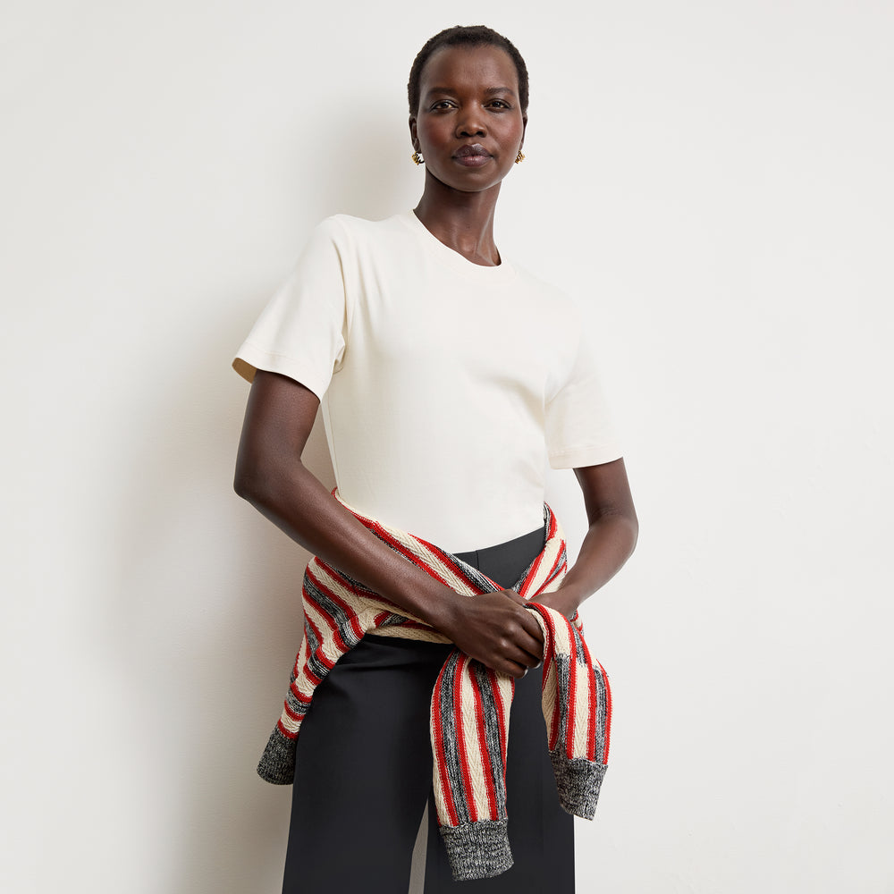 Front image of a woman wearing the leslie top in compact cotton in ivory