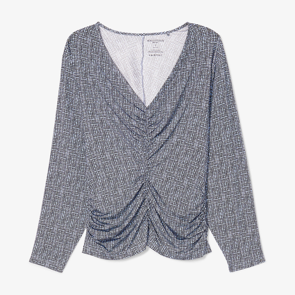 Packshot image of the amina top in blueprint sketch
