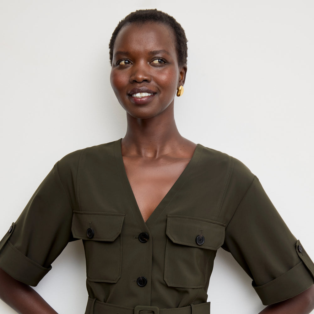 Front image of a woman wearing the Artemis Dress in Olive