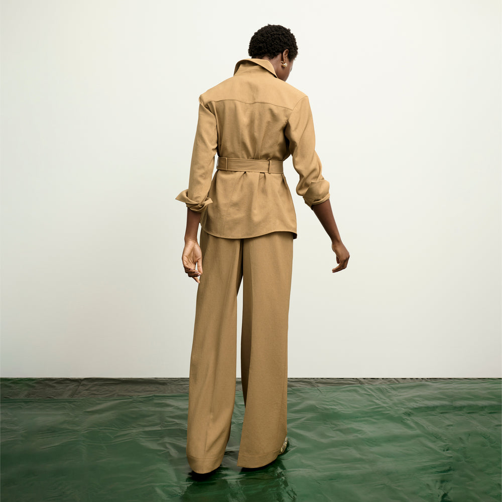 image of a woman wearing the avelyn jacket in macaroon