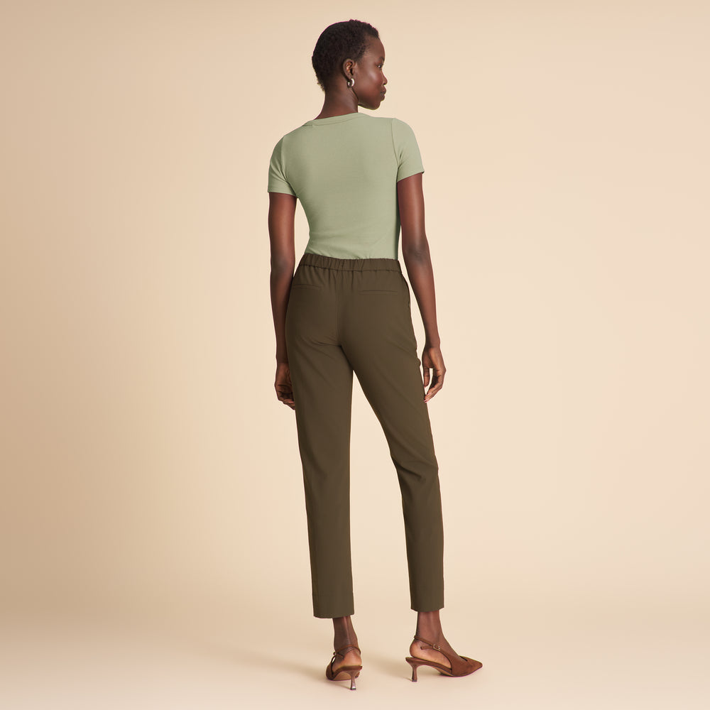 Woman wearing the Colby pant in olive