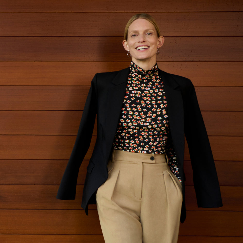 front image of a woman wearing the axam top in kaleidoscope print