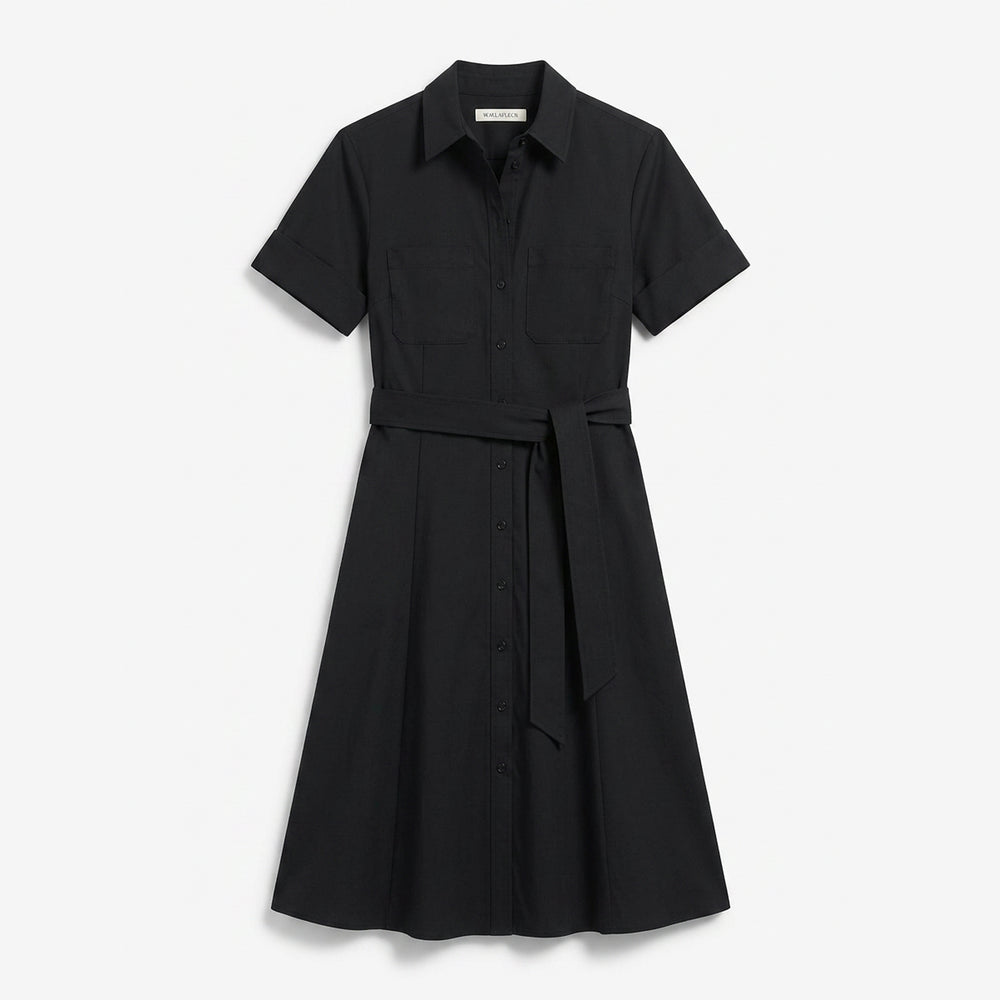 Black dress with short sleeves and a belt on a white background