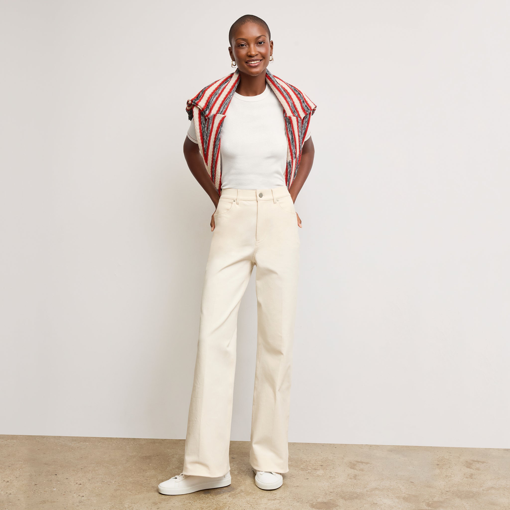 front image of a woman wearing the chana top in white