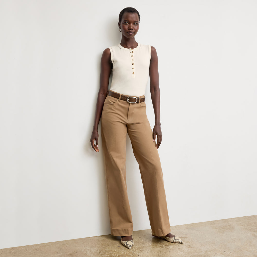 front image of a woman wearing the crimmins top in ivory