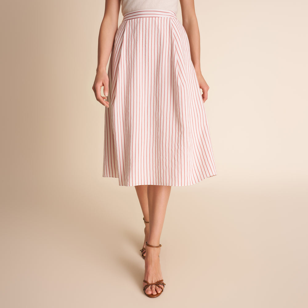 white and orange stripped skirt.