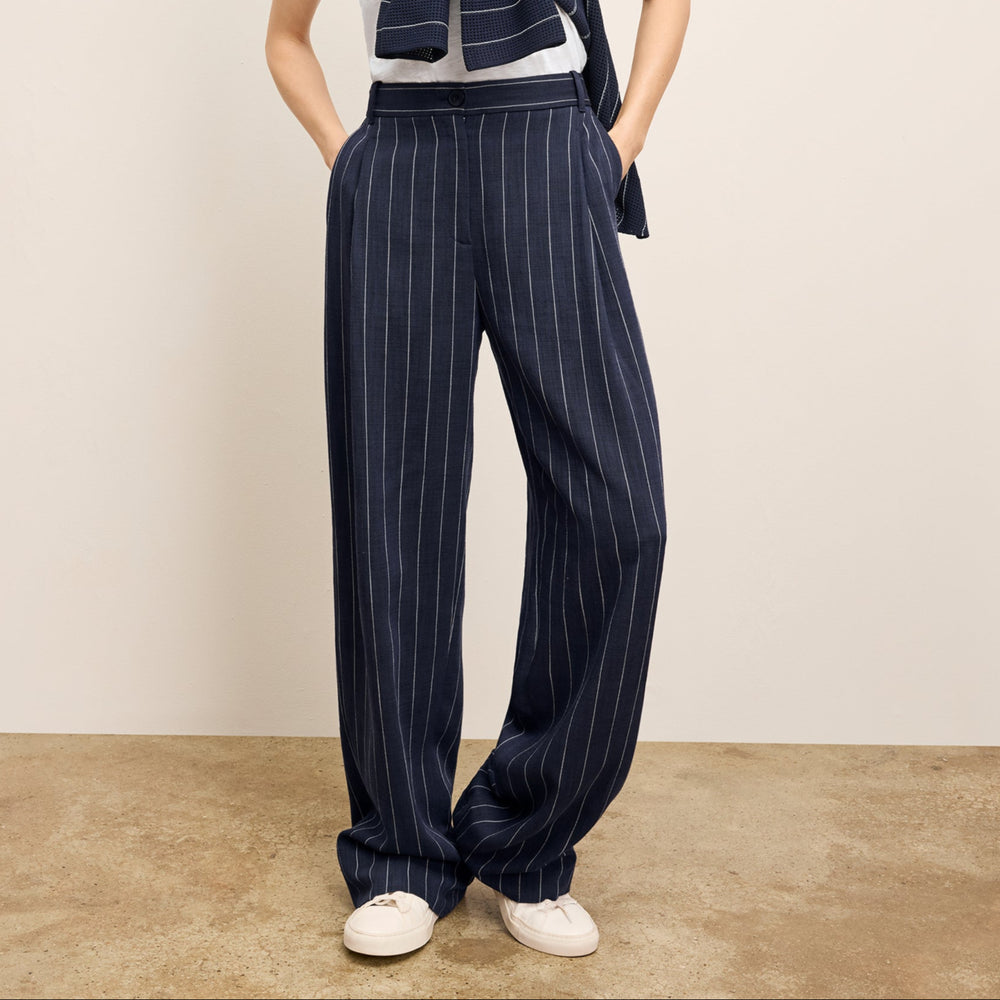 Front image of a woman wearing the Fitz Trouser in Porto Weave