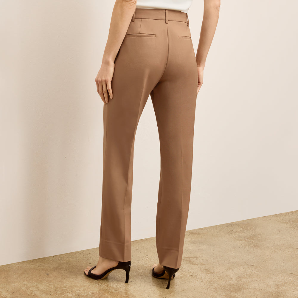 back image of a woman wearing the smith pant in saddle