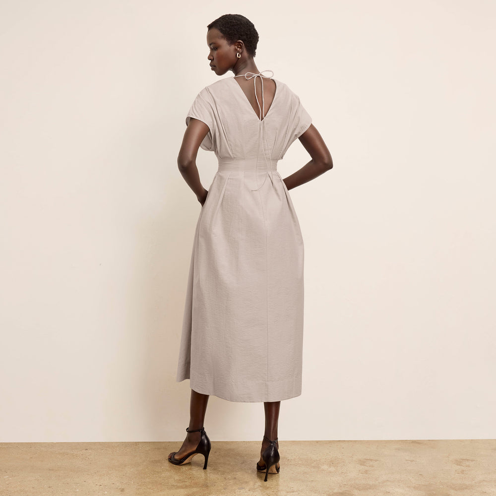 Back image of a woman wearing the Jelina Dress in Quartz Voile