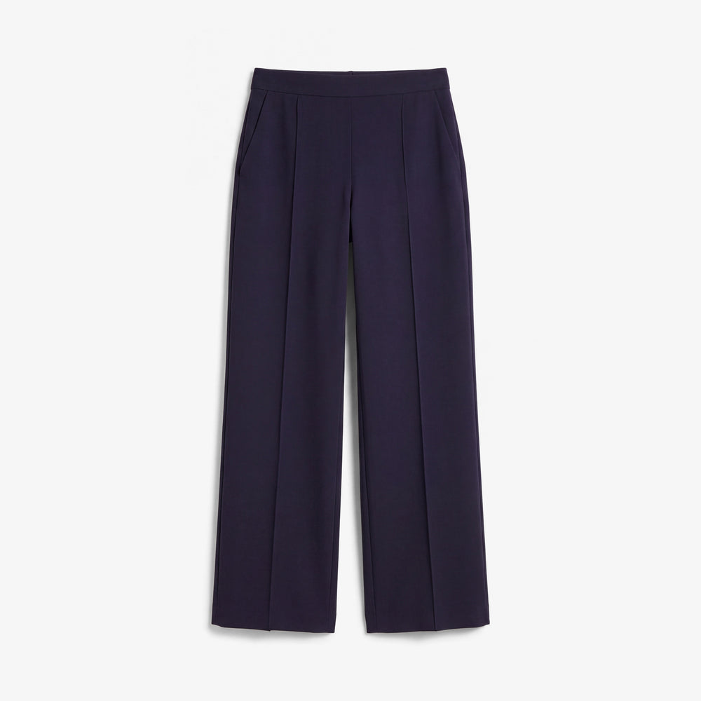 A pair of dark navy blue cropped trousers with front pleats, shown flat against a light gray background.