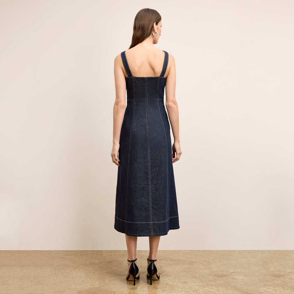 back image of a woman wearing the kenna dress in midnight wash