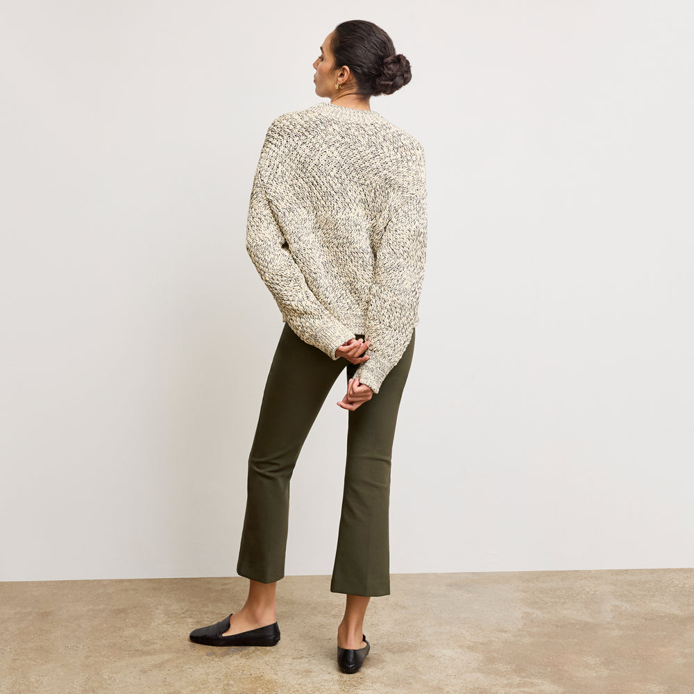 back image of a woman wearing the kick flare foster pants in olive