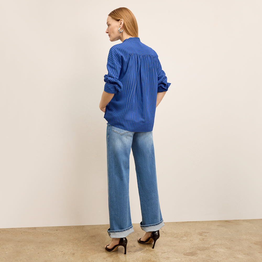 back image of a woman wearing the kylan top in soft stripe