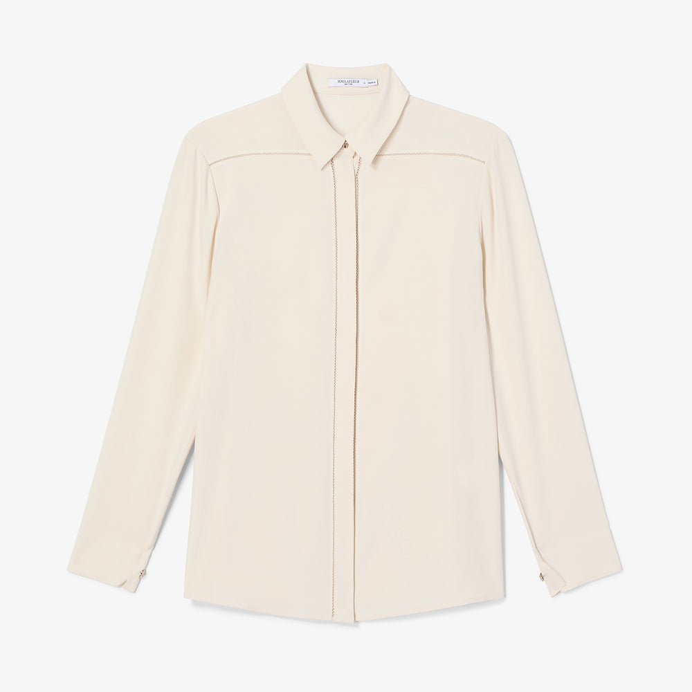 Beige shirt on a white background