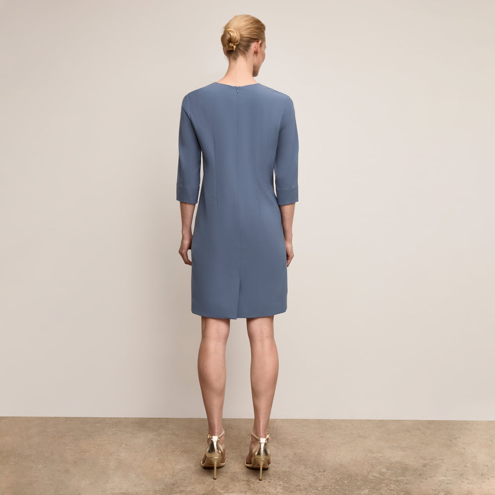 Back image of a woman wearing Lancia Dress Origamitech Dusty Blue