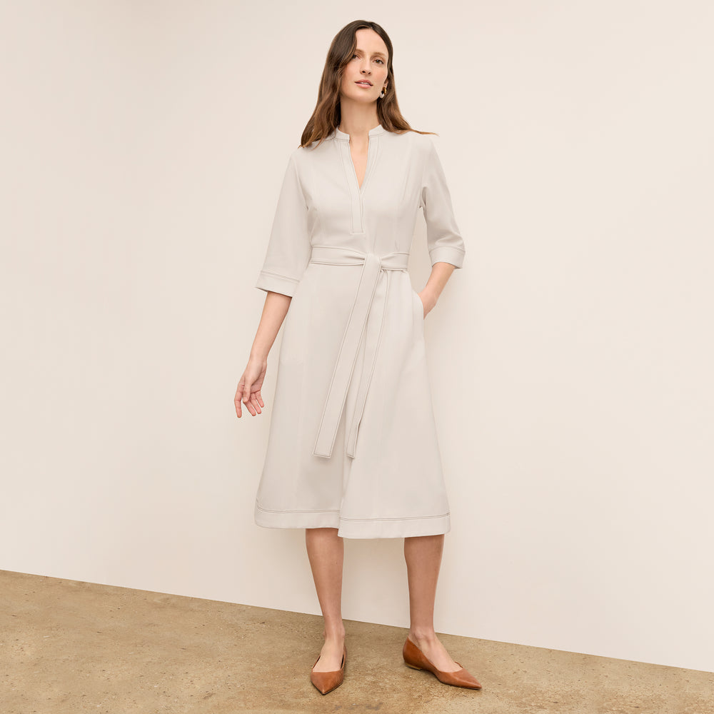 front image of a woman wearing the laueleh dress in eggshell