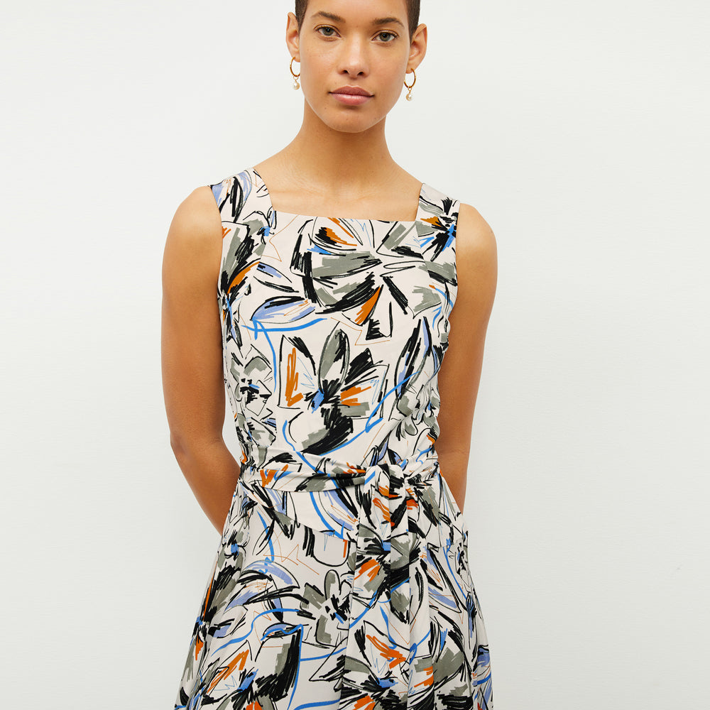 front image of a woman wearing the diemmy dress in sketchbook floral