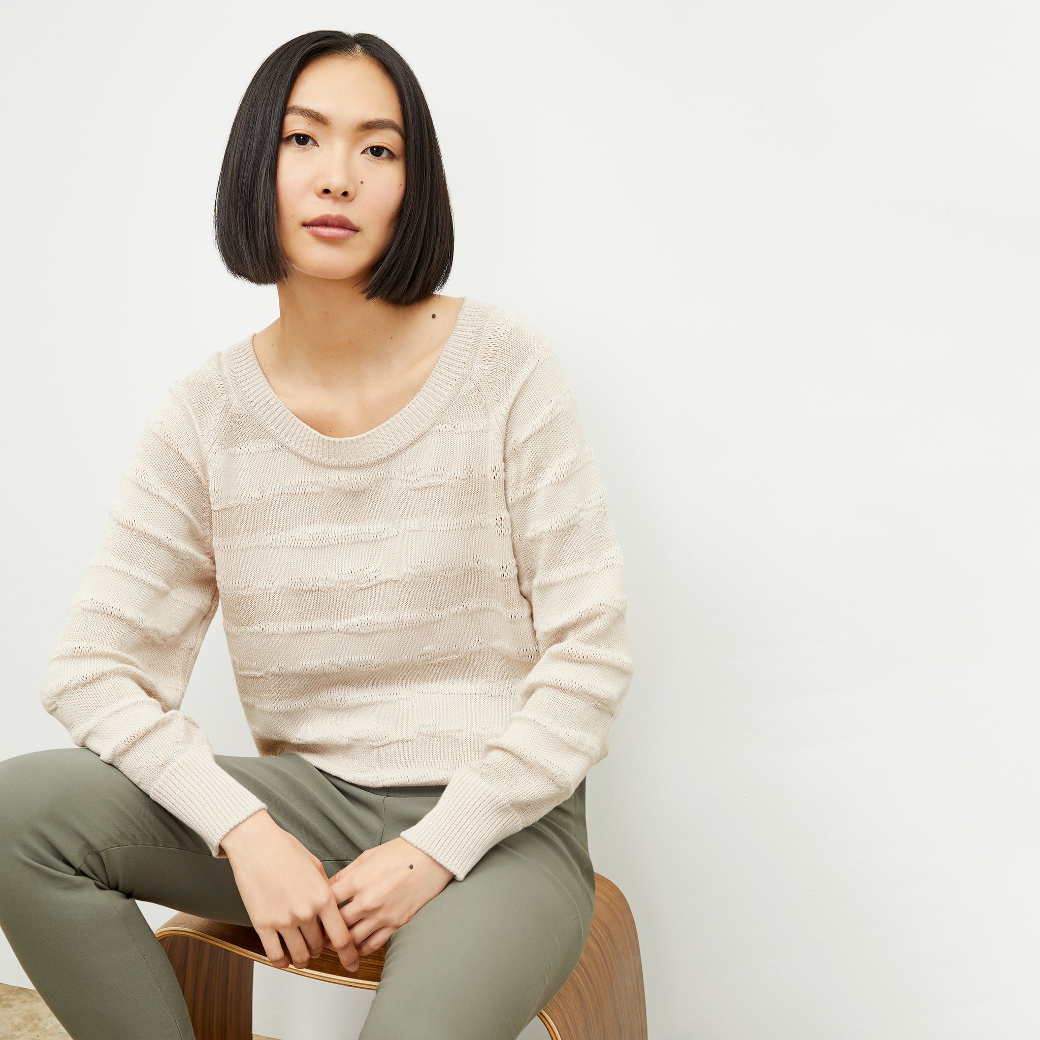 front image of a woman wearing the jo sweater in moonbeam 