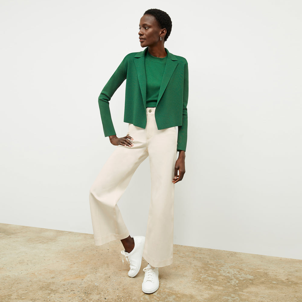 front image of a woman wearing the leslie tee in vine