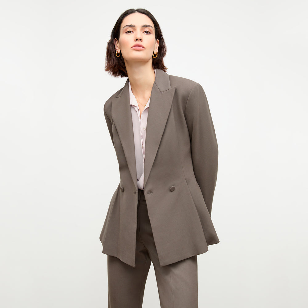 Front image of a woman wearing the Gaia Jacket - Sharkskin in Mink