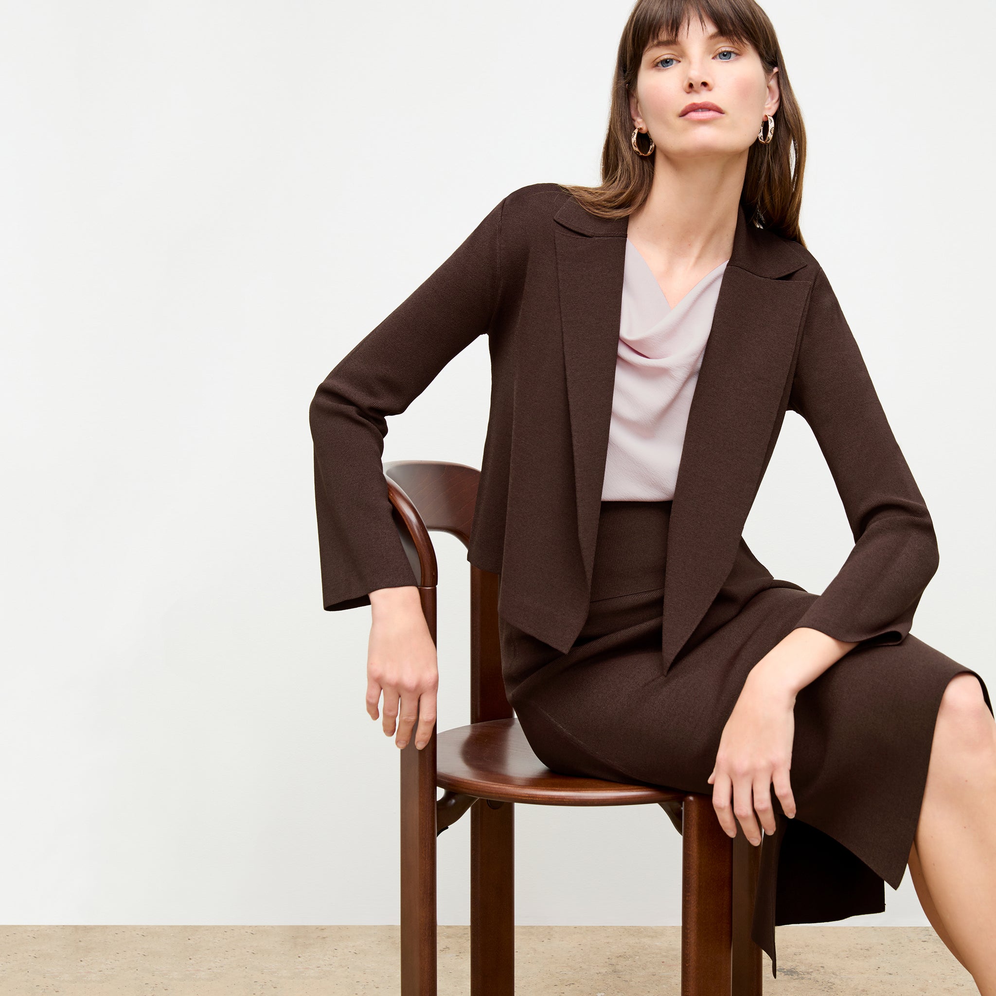 front image of a woman wearing the nora top in blossom