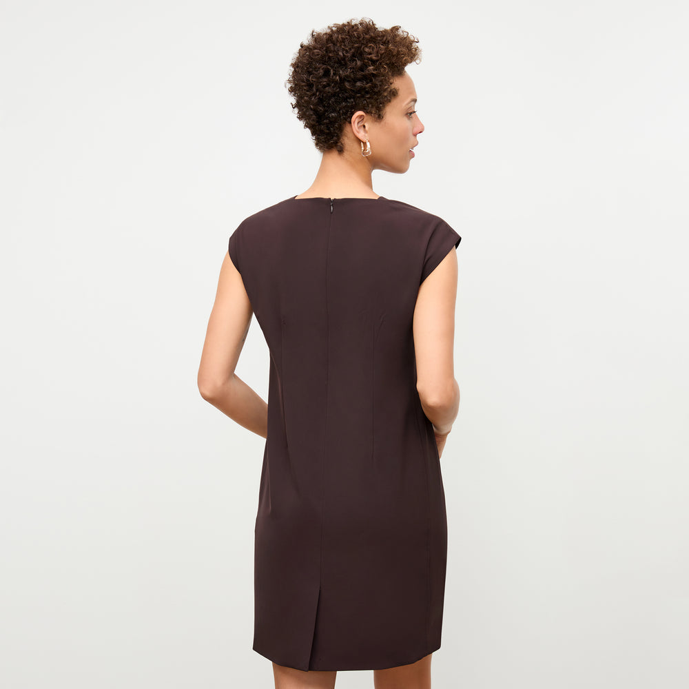 back image of a woman wearing the maaza dress in wine