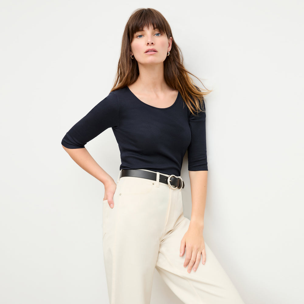 front image of a woman wearing the soyoung t-shirt in galaxy blue