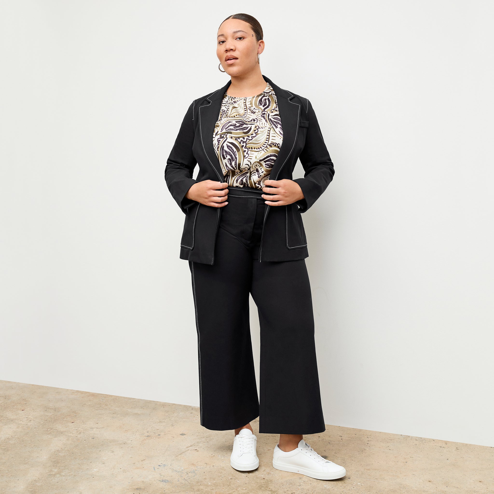 front image of a woman wearing the grenville jacket in black 