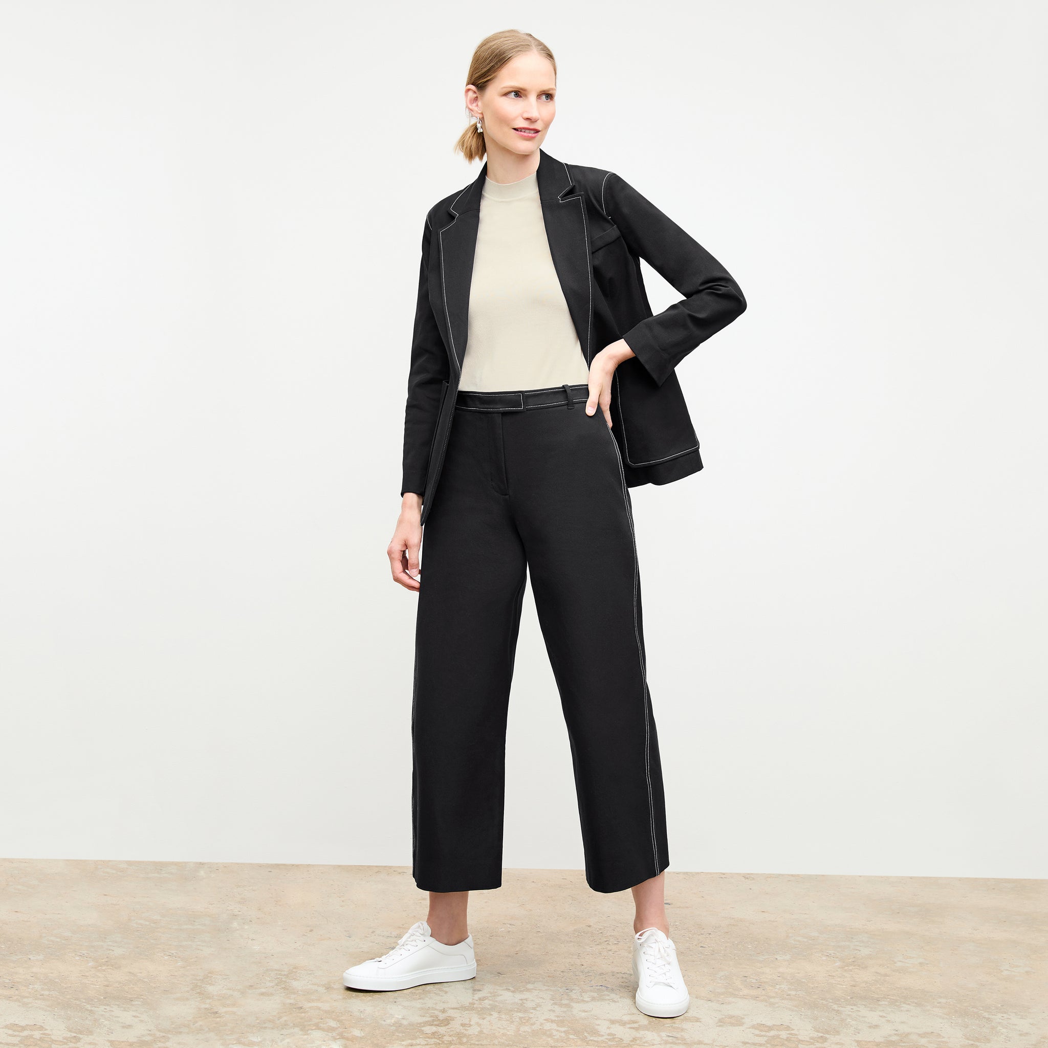 front image of a woman wearing the grenville jacket in black 