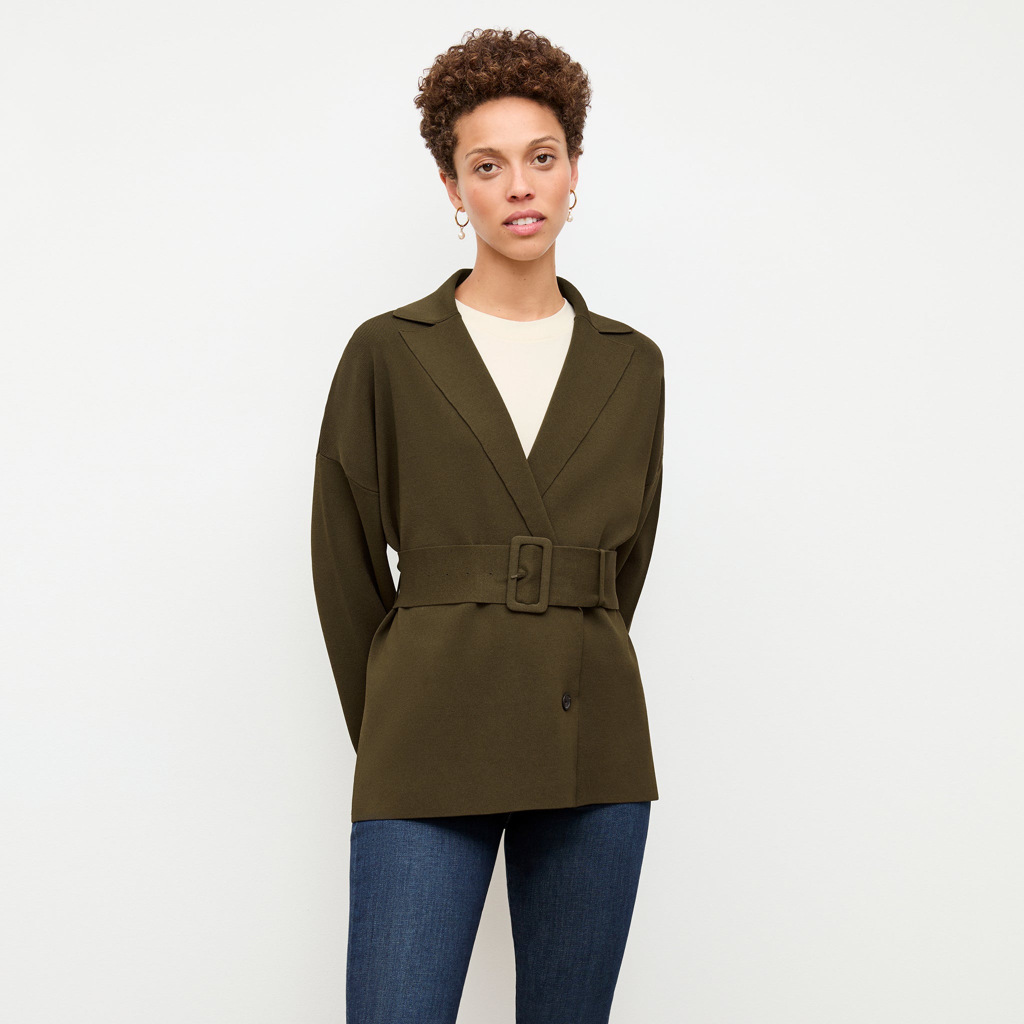 front image of a woman wearing the yuwei jardigan in dark elm