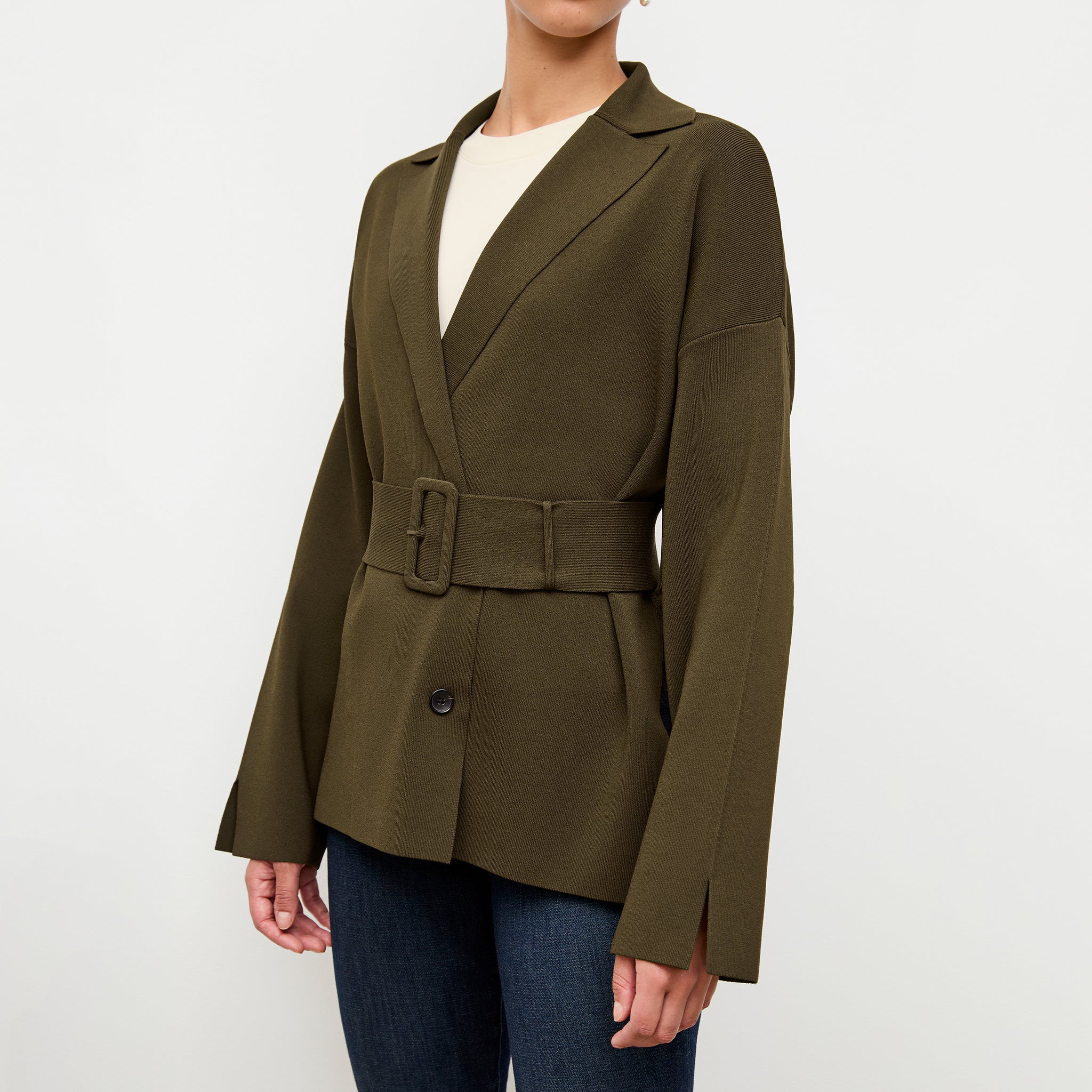 front image of a woman wearing the yuwei jardigan in dark elm