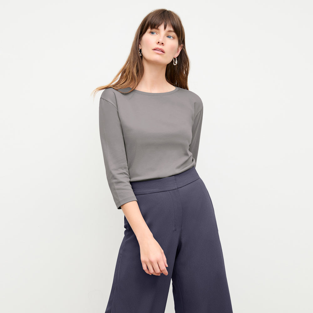 front image of a woman wearing the owen t-shirt in thistle