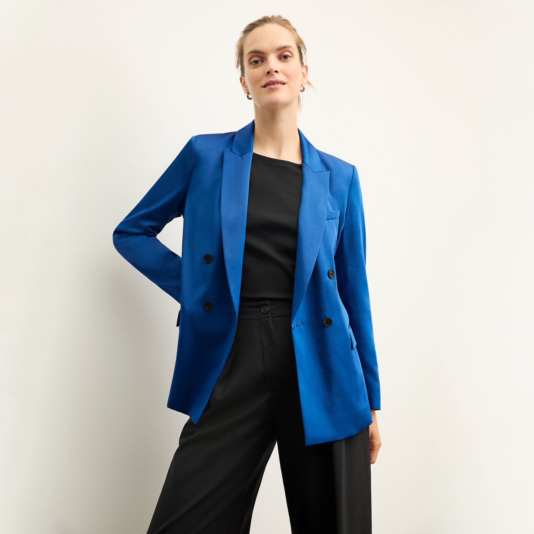 front image of a woman wearing the o'hara jacket in sapphire