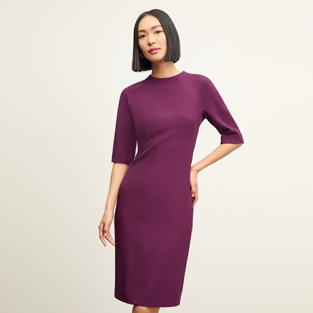 front image of a woman wearing the farnoosh dress in plumberry