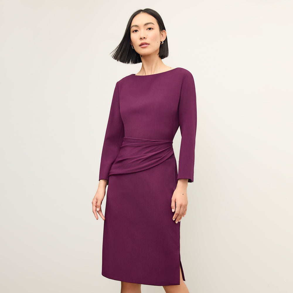 front image of a woman wearing the maxine dress in plumberry