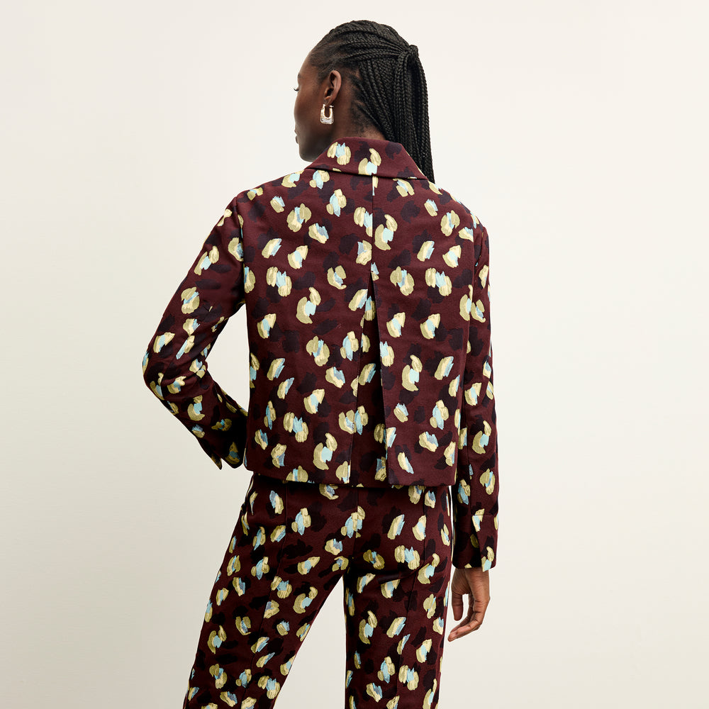 back image of a woman wearing the nicky jacket in bengal jacquard