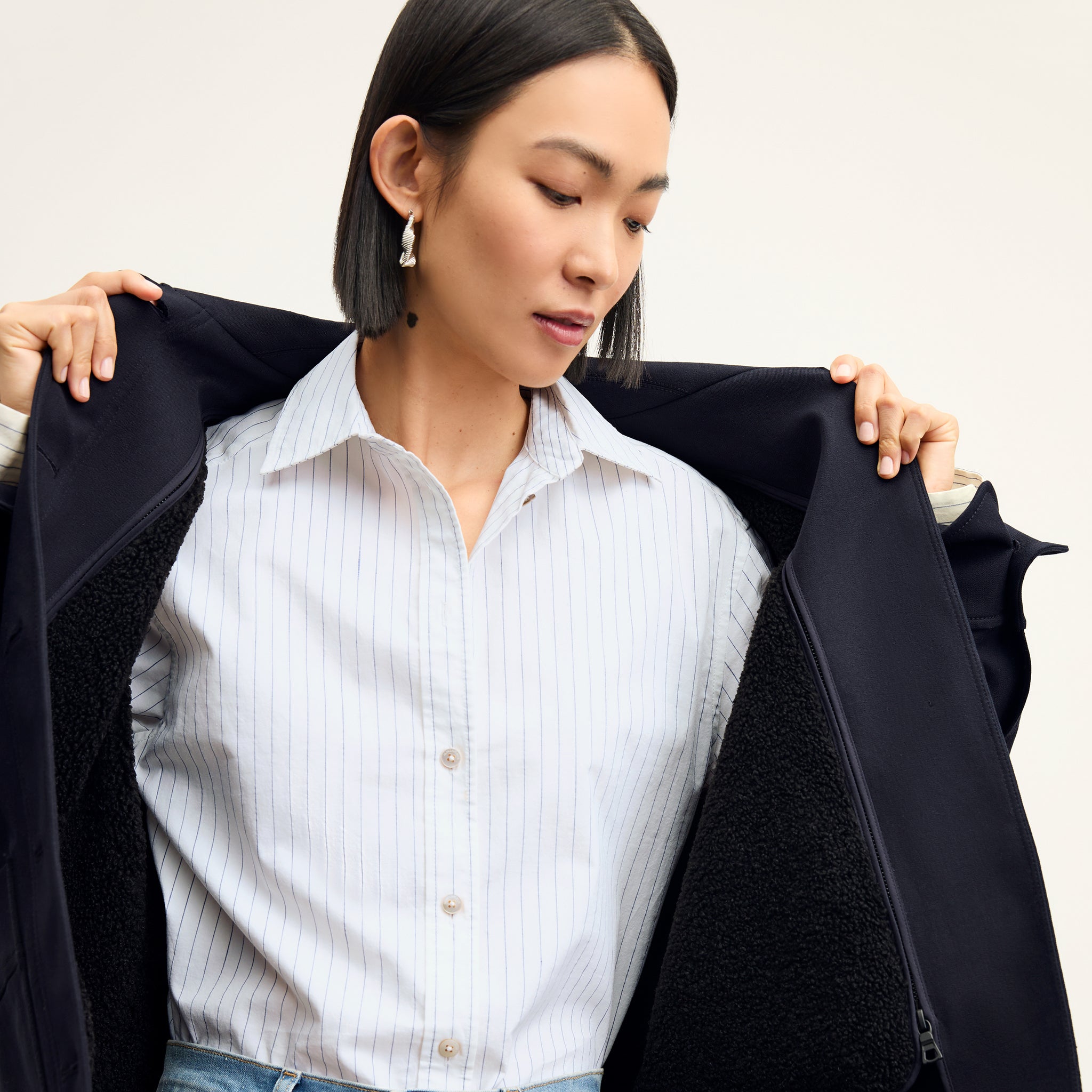 Front image of a woman wearing the steffi jacket in ink