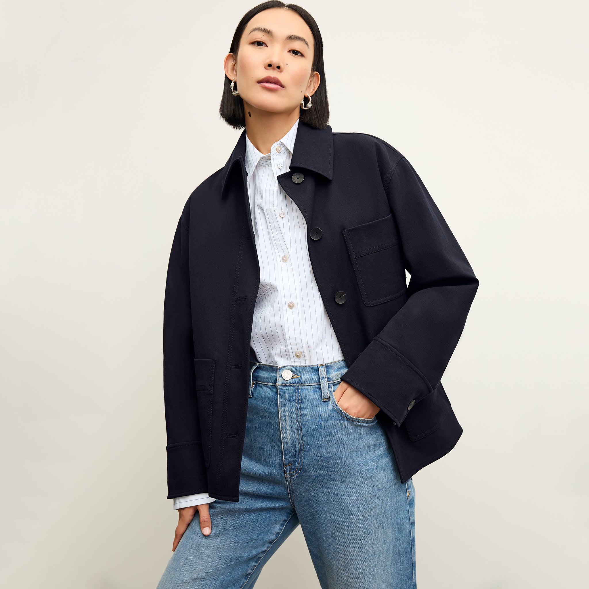 Front image of a woman wearing the steffi jacket in ink 