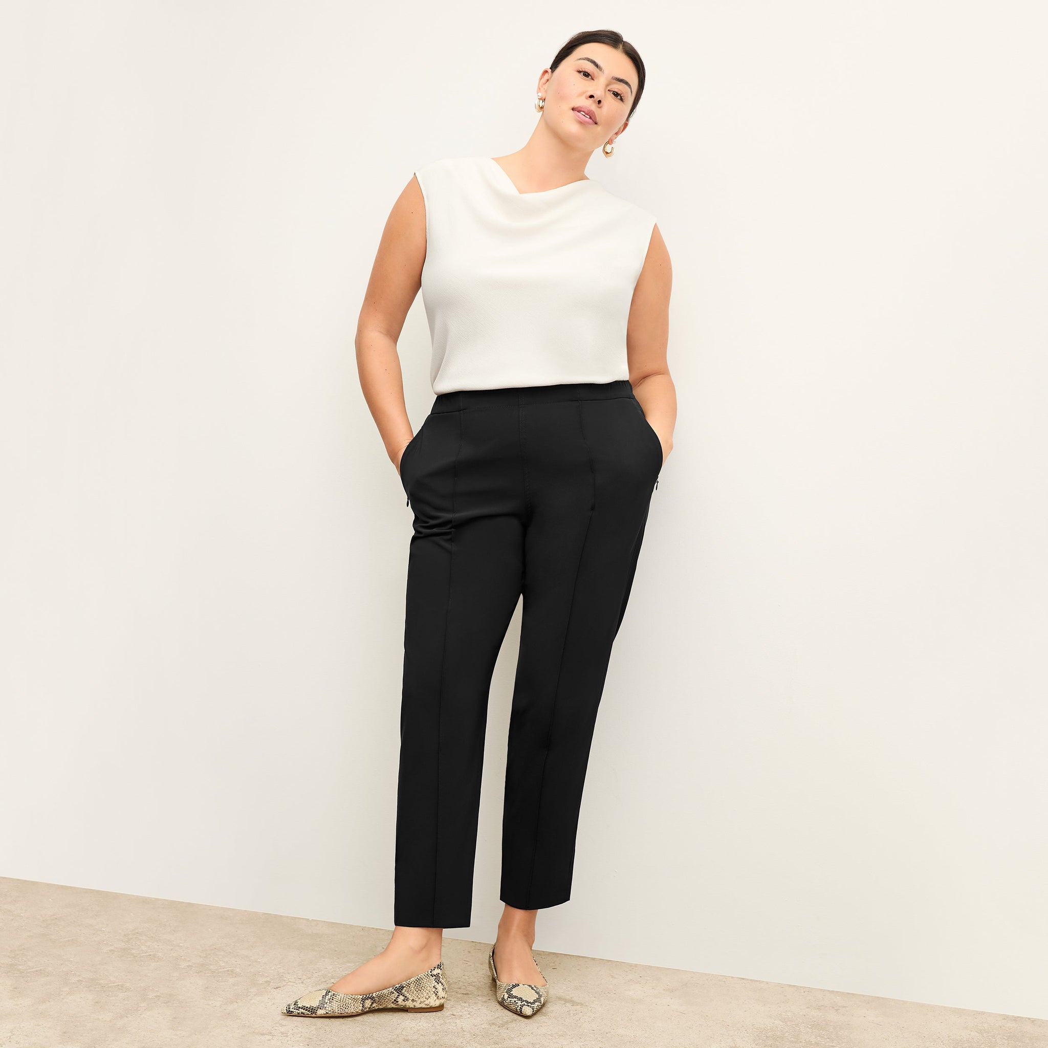 Front image of a woman standing wearing the Colby Jogger in Black