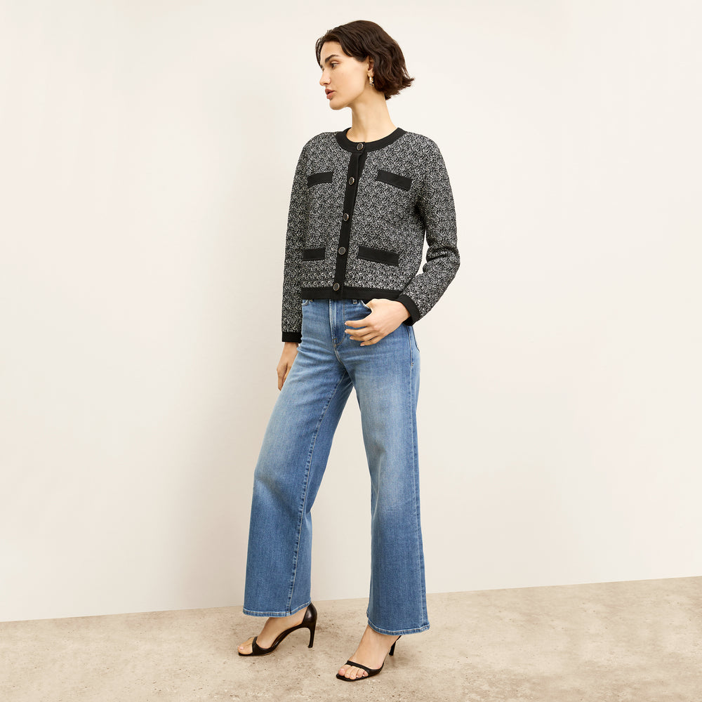 front image of a woman wearing the FRAME le slim palazzo jeans in drizzle