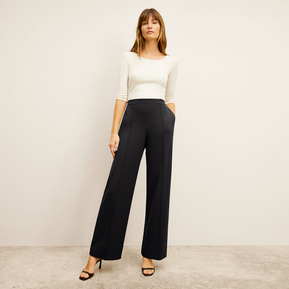 front image of a woman wearing the jordan trouser in black
