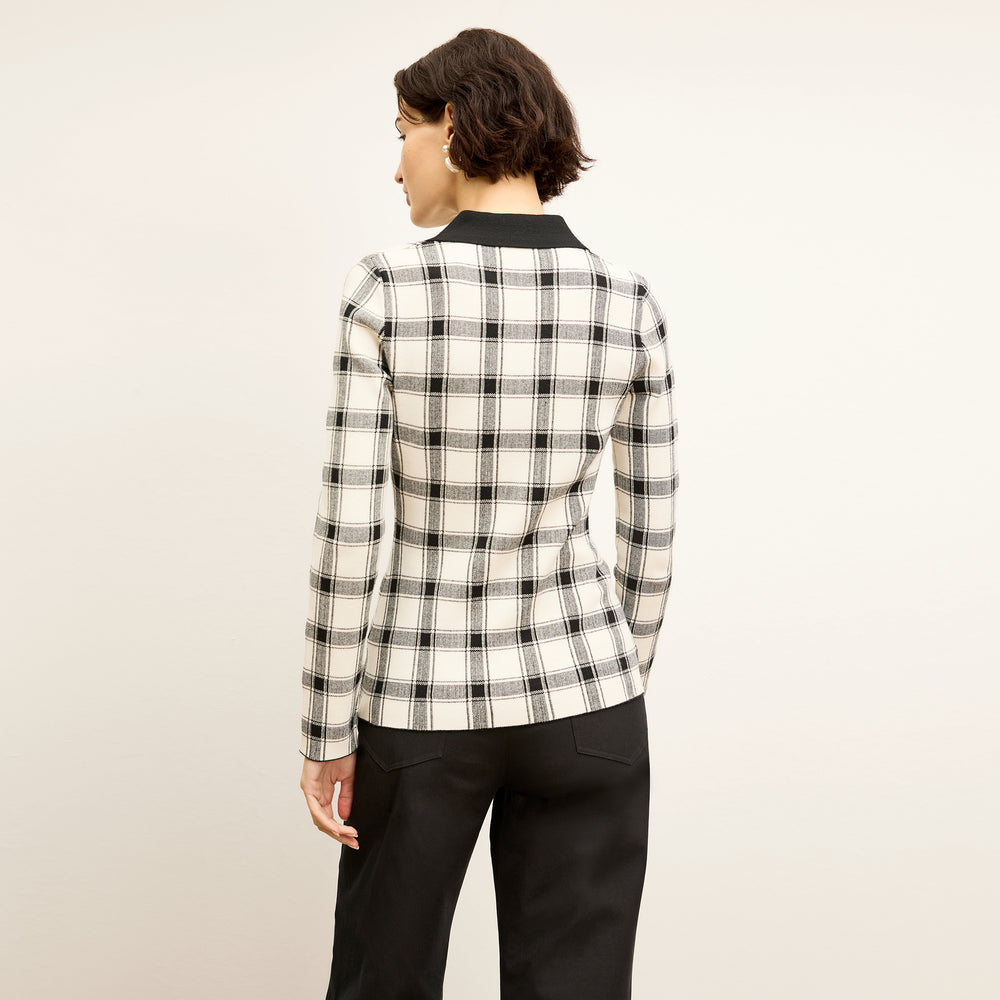 Back image of a woman wearing the Lacie top