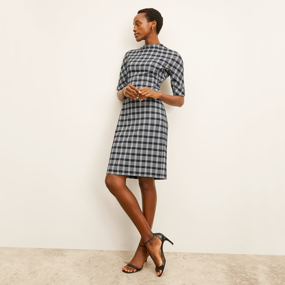 front image of a woman wearing the farnoosh dress in checkmate