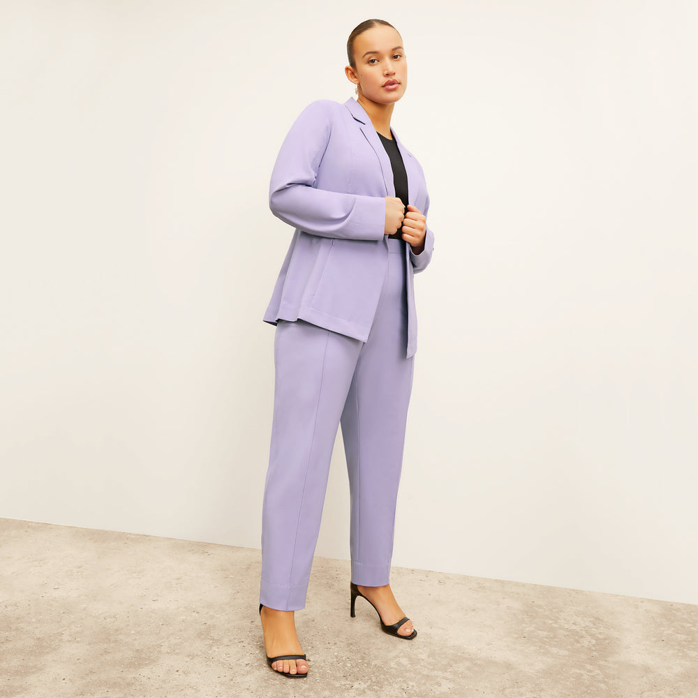 front image of a woman wearing the colby pants in light orchid