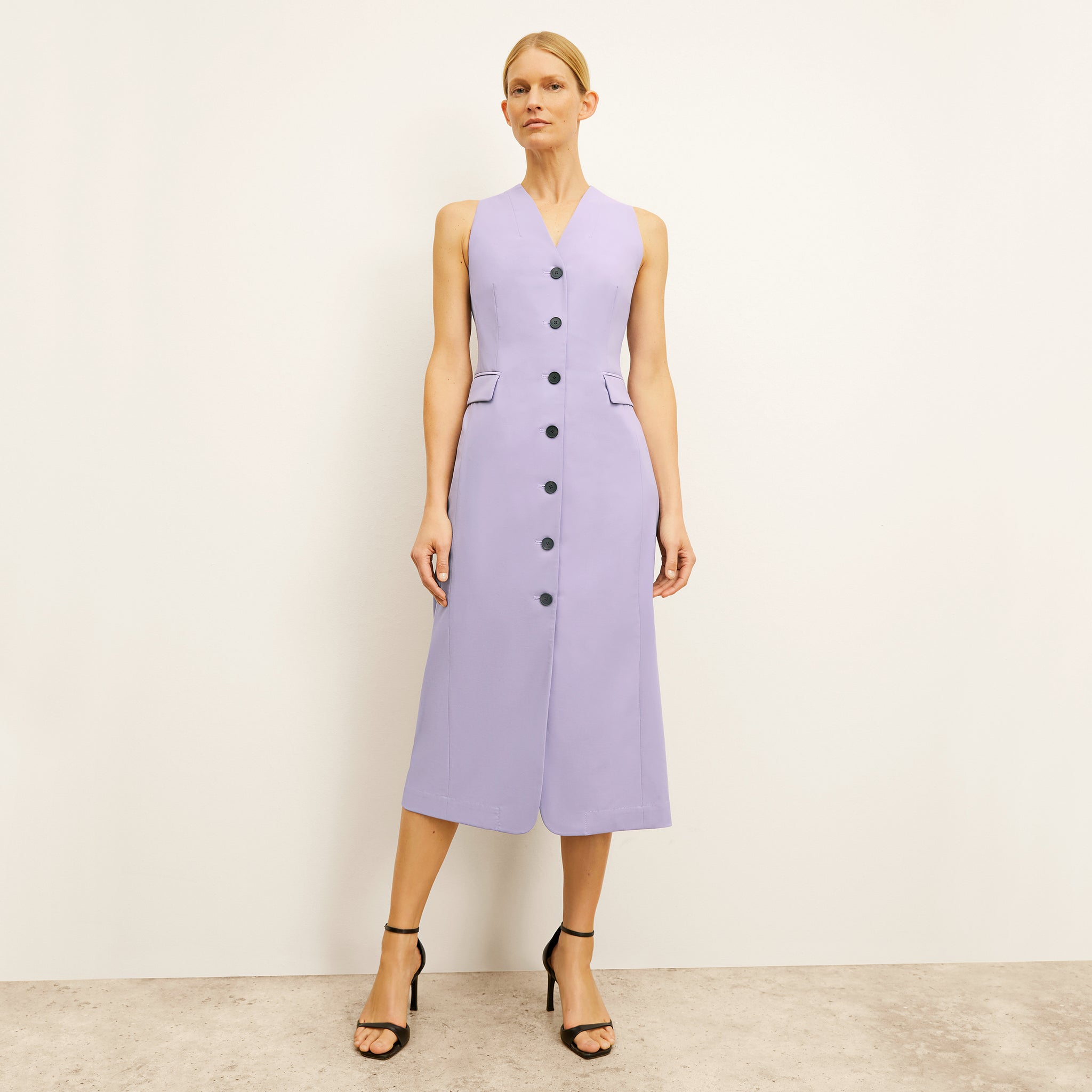 Front image of a woman wearing the Cassandra dress 